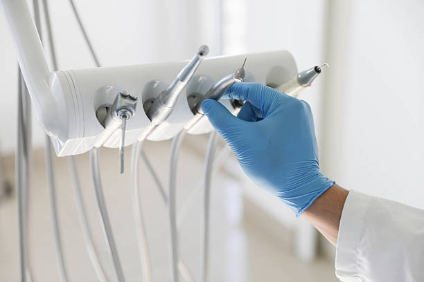 Professional Tooth Extraction technician working in Poulsbo, WA